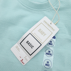 T-shirt turquoise texturé à poche – 36 mois