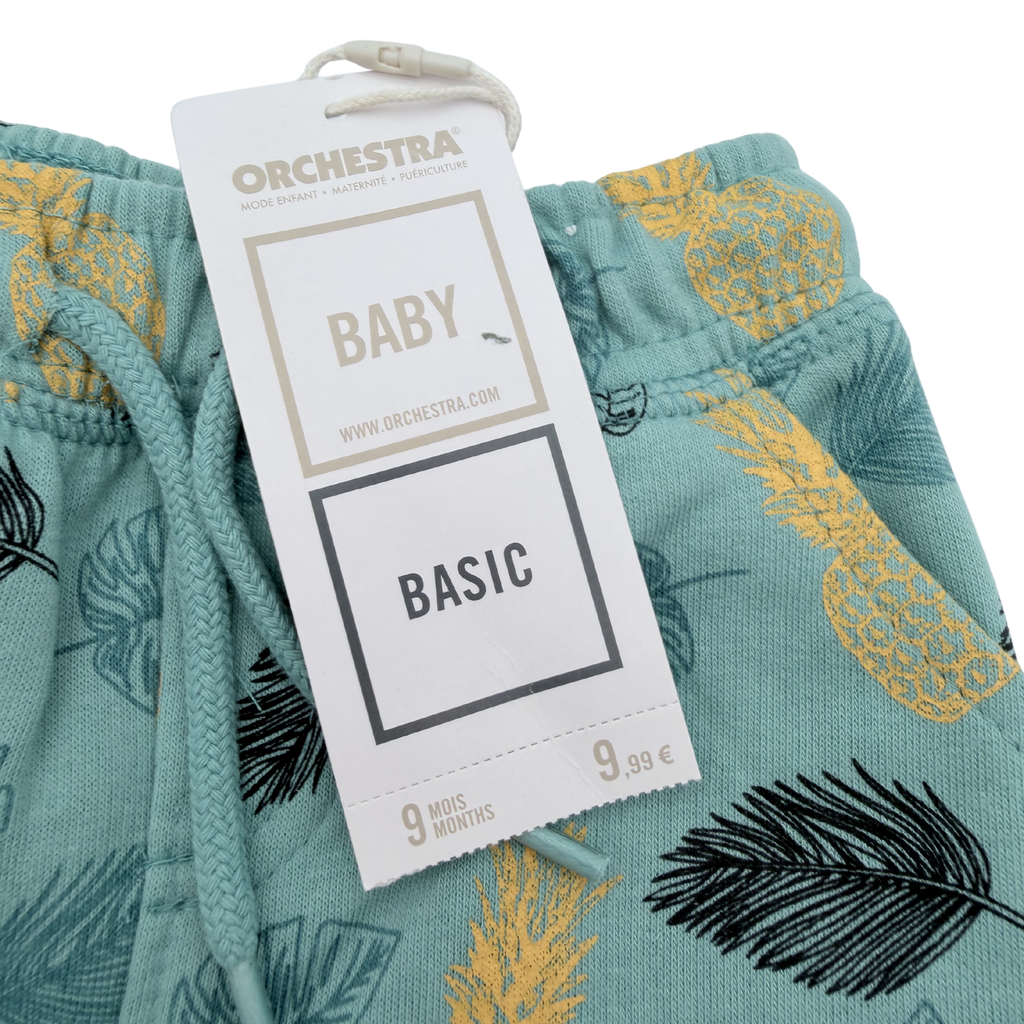 Short bleu imprimé ananas et feuilles — 9 mois