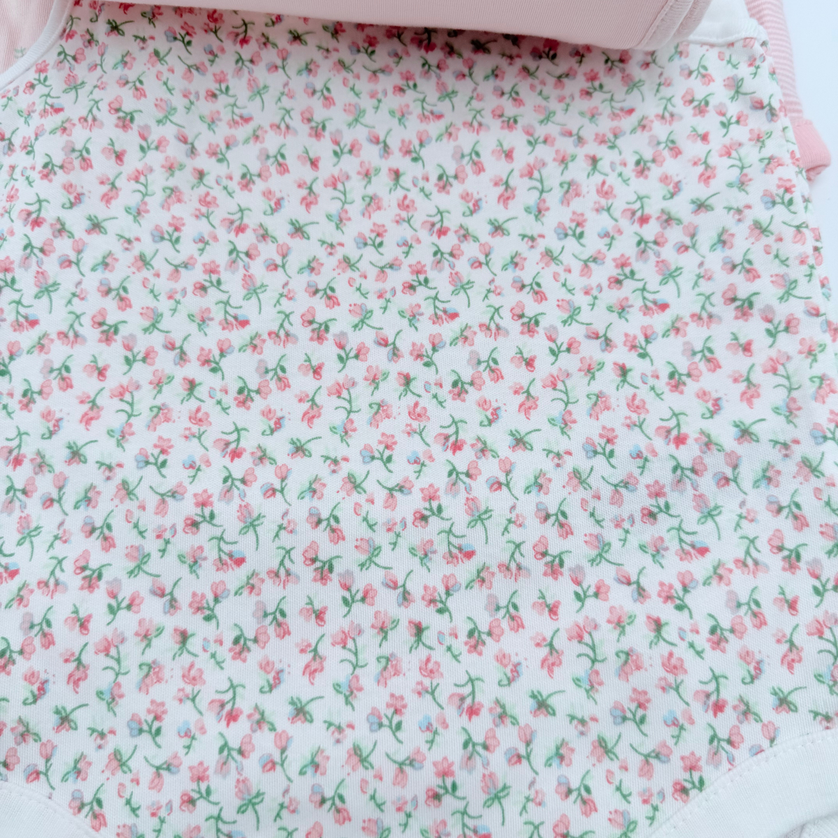 Lot de 5 bodies sans manches roses et fleuris - 12-18 mois