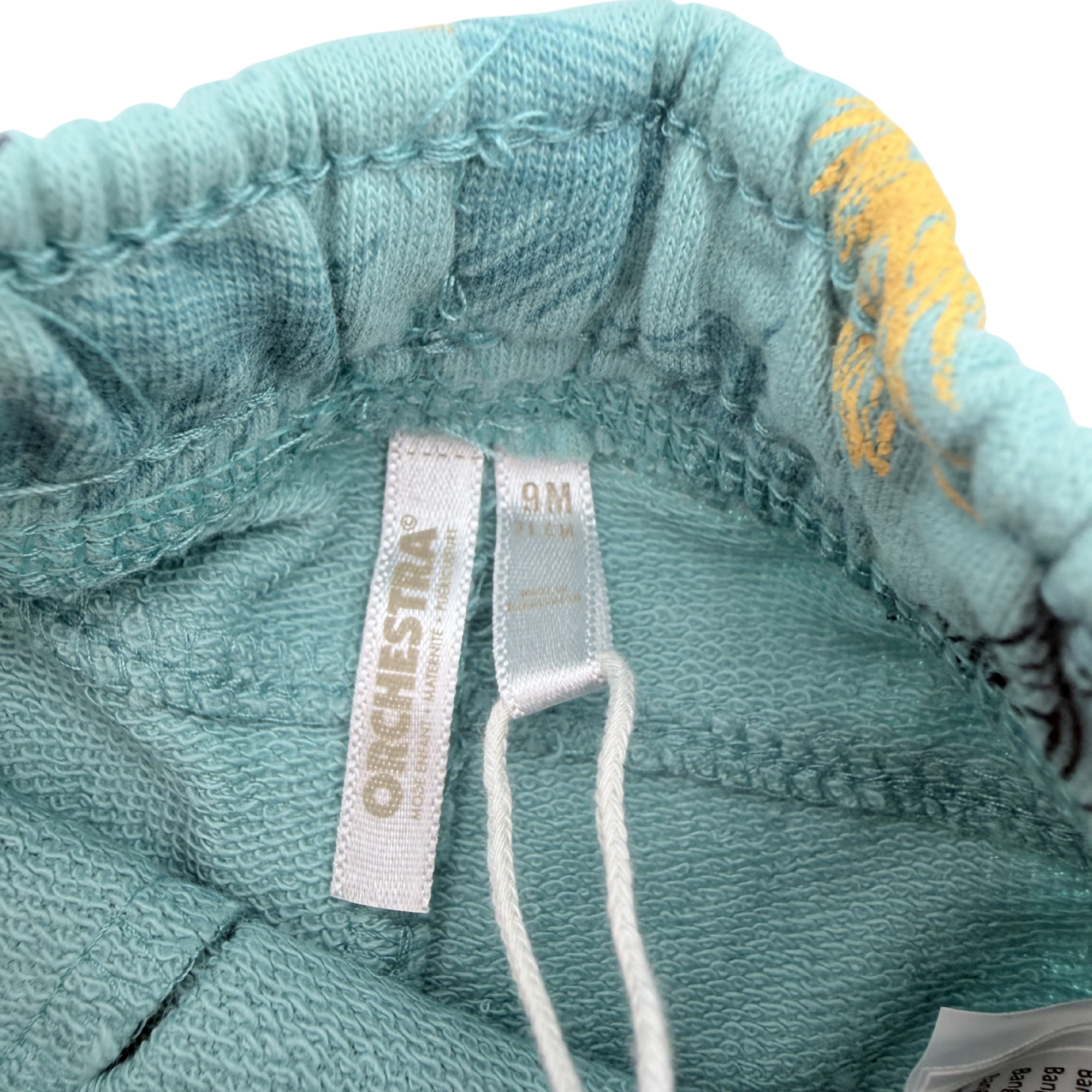 Short bleu imprimé ananas et feuilles — 9 mois