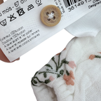 Combinaison fleurie avec bonnet — 6 mois