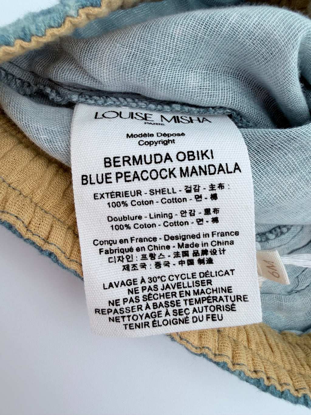 Short bleu imprimé palmiers — 6 mois